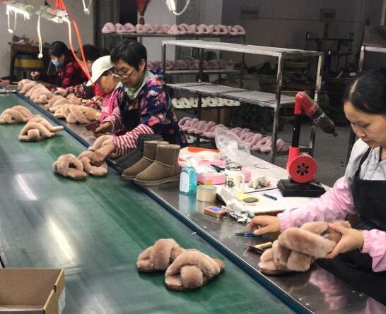 Assembly Line Slippers: Close-up view of the slipper assembly line at the JNP Footwear factory