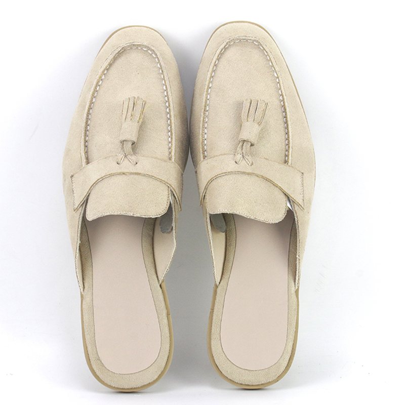 Top view of custom cream/beige suede loafer-style slippers with tassels by JNP Footwear