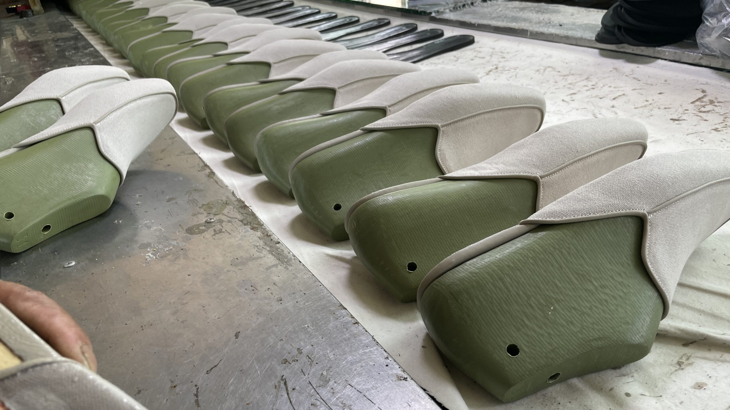 Slipper uppers on green lasts in JNP Footwear's efficient manufacturing line for B2B orders