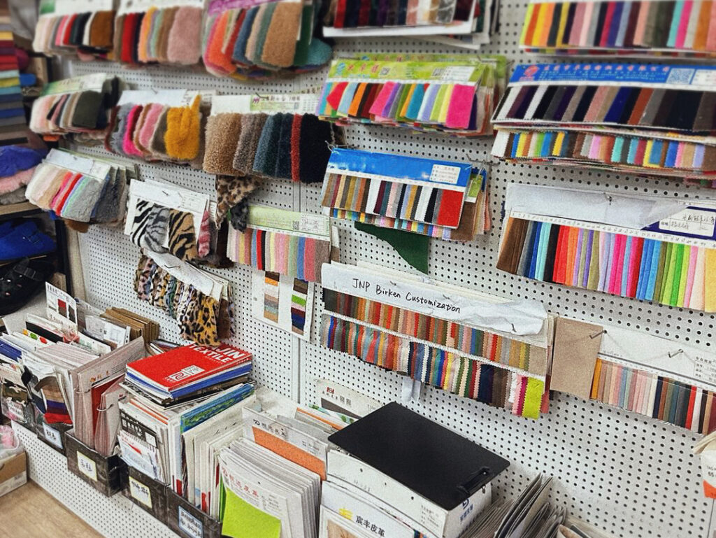 various fabric samples in different textures and colors